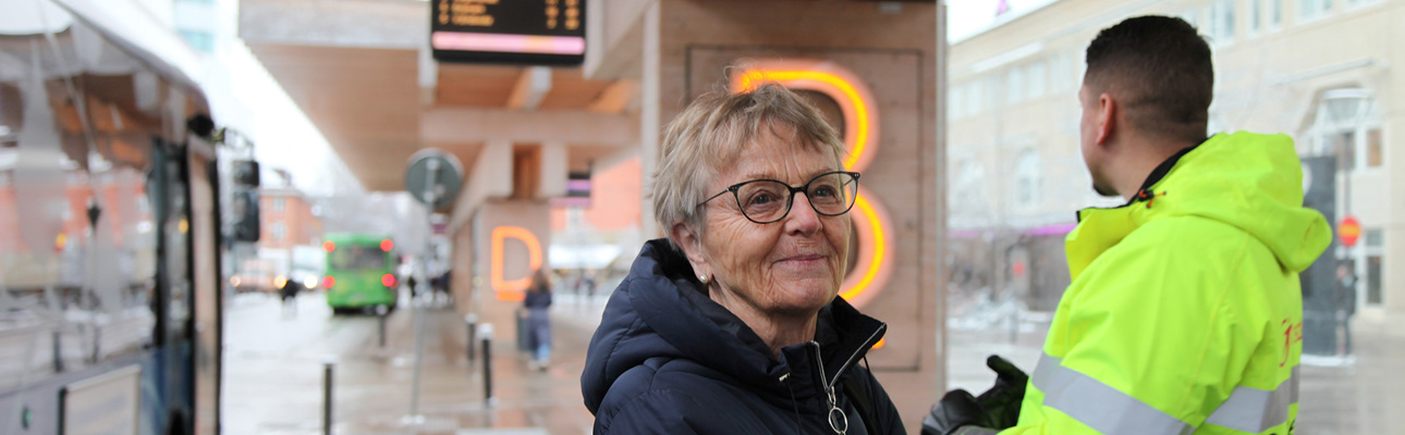 A happy bus passenger